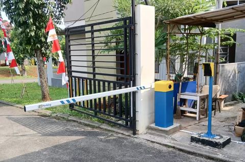 Palang pintu otomatis di area parkir